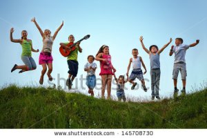 stock-photo-happy-kids-jumping-on-summer-field-145708730